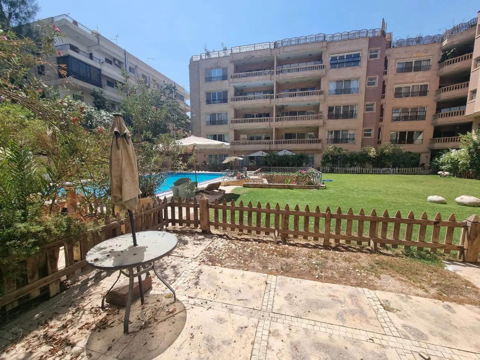 SUNNY SPACIOUS GROUND FLOOR WITH SHARED SWIMMING POOL FOR RENT IN SARAYAT EL MAADI CAIRO EGYPT - #5584 - Semi furnished
